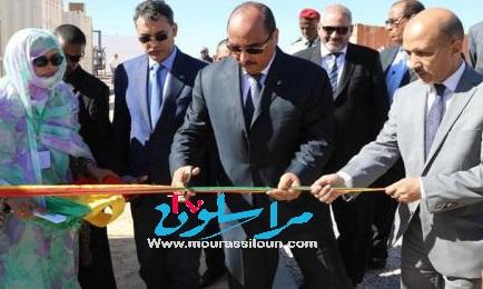 اثناء قطع الشريط الرمزي للمشروع